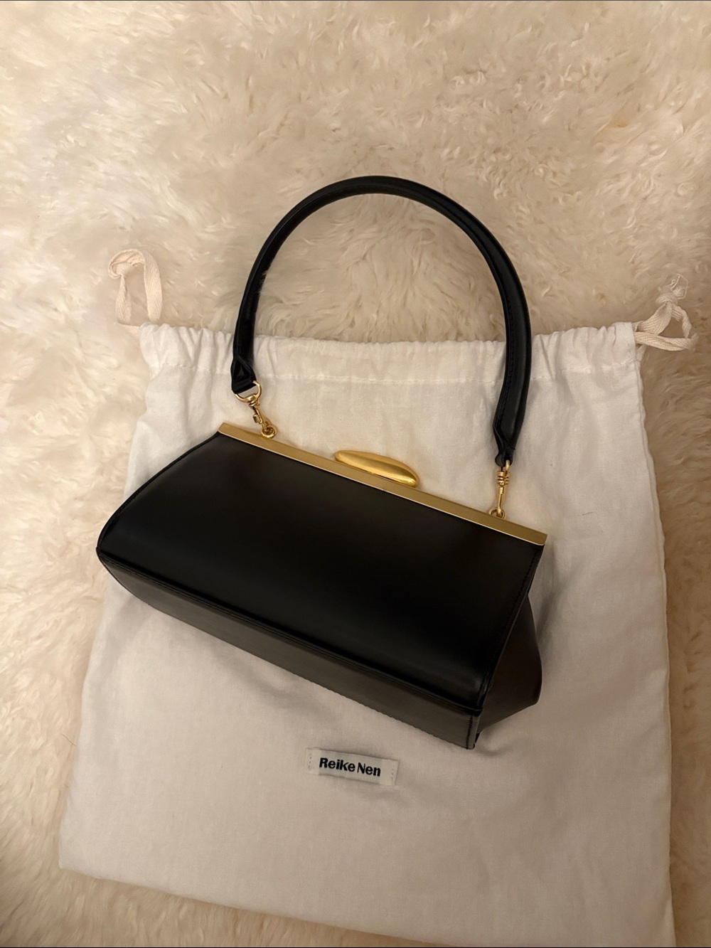 Reike Nen Black Leather Frame-Top Clutch with Gold Hardware
